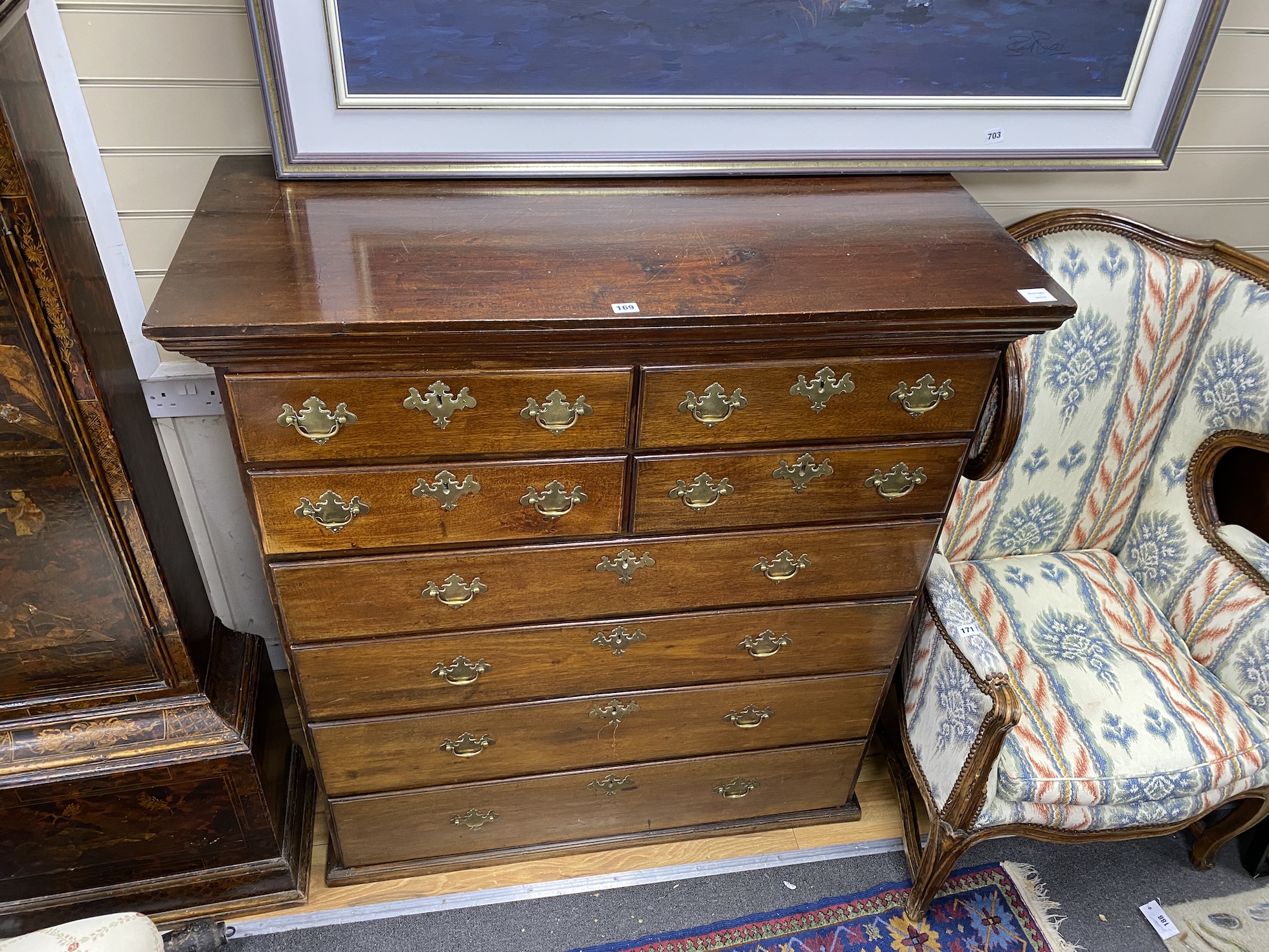 A George III mahogany chest of four short and four long drawers, width 114cm, depth 51cm, height 125cm